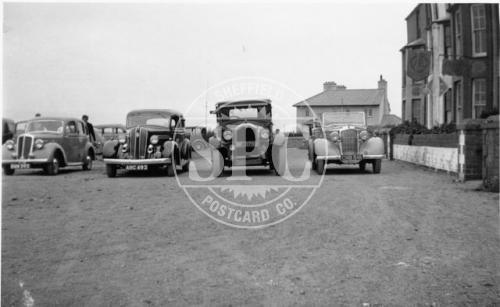 Old Cars on Beach Terrace (outside Wave Crest Hotel)