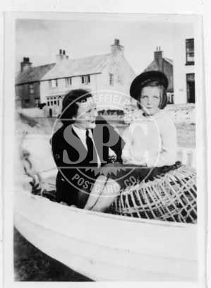 Girl sat on Lobster Pot, Rhosneigr